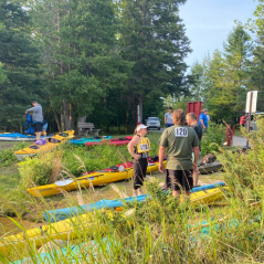 Kayak Racers Getting into Water at Sykek Park