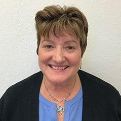 Julie Fluder retires.