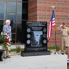 Congressman Jack Bergman and the Alpena Veterans Color Guard posting the colors at our new monument.